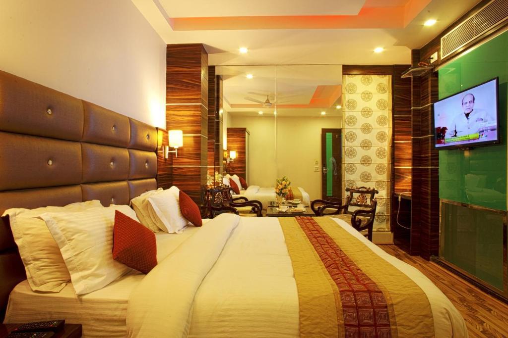 Hotel Delhi 55 -City Center Ню Делхи Стая снимка